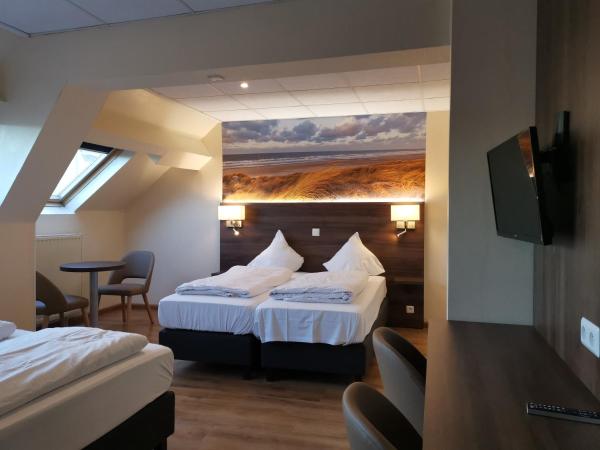 Hotel Albert II Oostende : photo 1 de la chambre chambre quadruple confort