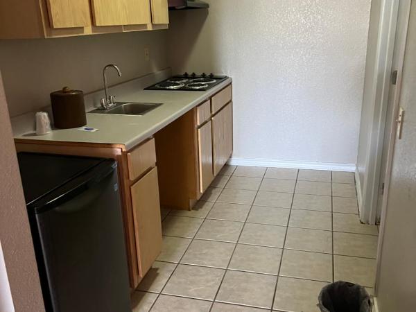 COUNTRY INN MOTEL : photo 4 de la chambre chambre lit king-size avec kitchenette