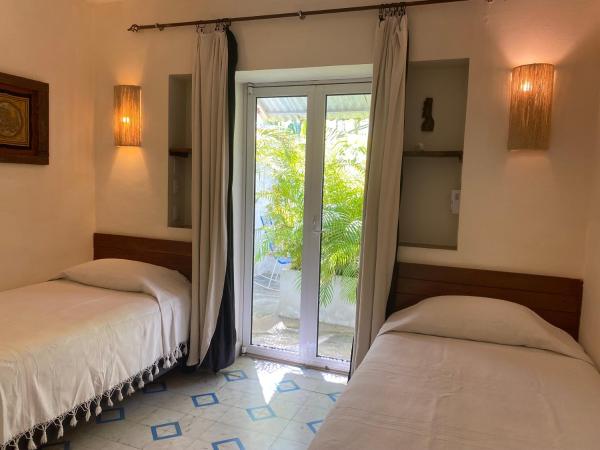 Hotel La Piazzetta : photo 3 de la chambre chambre lits jumeaux standard