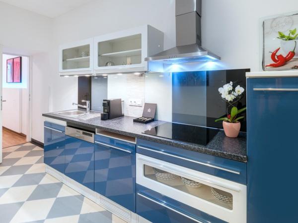 Best Western Plus Celebrity Suites : photo 8 de la chambre suite avec terrasse et jardin