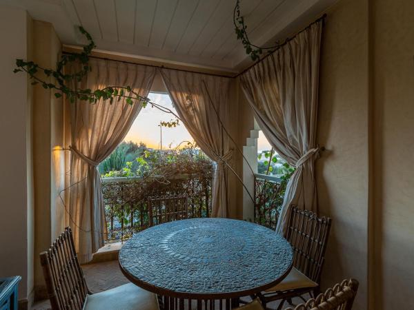 Le Riad Villa Blanche : photo 2 de la chambre suite junior exécutive avec cheminée et loggia