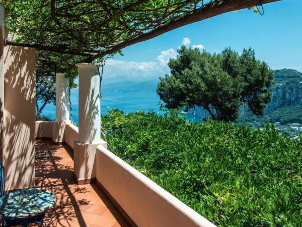 La Casa nel Bosco : photo 1 de la chambre chambre lit king-size - vue sur mer