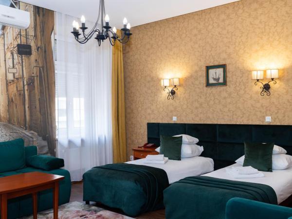 Hotel Wenecki : photo 1 de la chambre chambre lits jumeaux