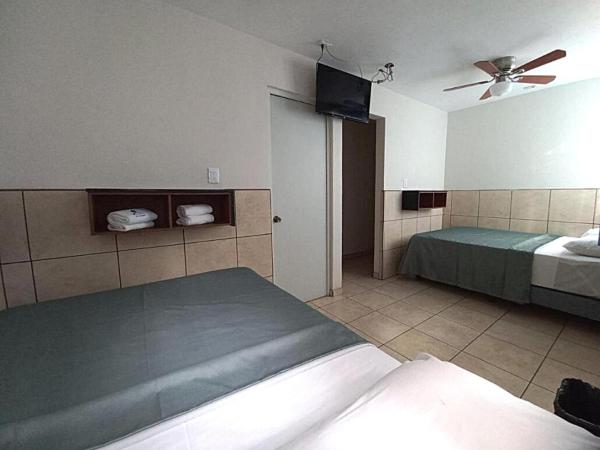 Hotel HCM Guadalajara : photo 3 de la chambre chambre quadruple