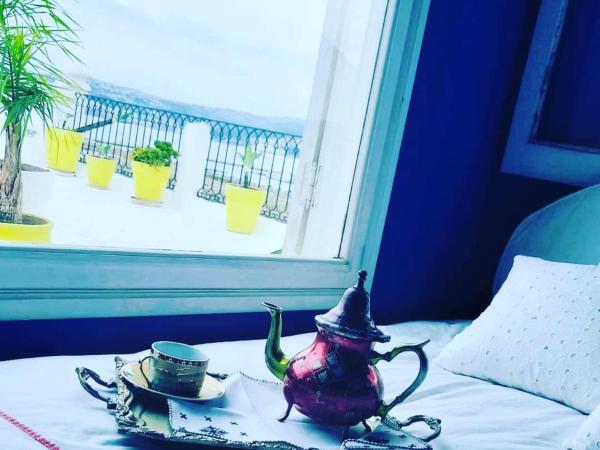 SUMMER HOUSE TANGER : photo 6 de la chambre chambre double deluxe - vue latérale sur mer
