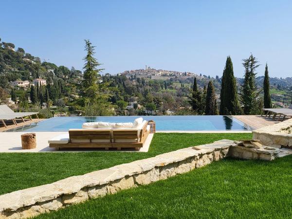 Ideal BnB : photo 10 de la chambre appartement avec terrasse et piscine