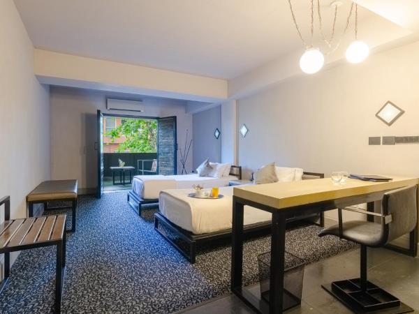 Prodeo Hotel + Lounge : photo 2 de la chambre chambre lits jumeaux supérieure