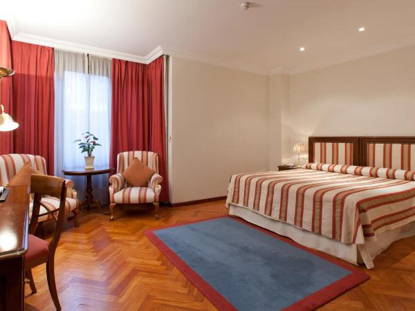 Don Pio : photo 10 de la chambre chambre double ou lits jumeaux