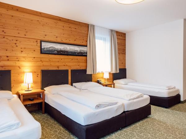 Hotel Bon Alpina : photo 3 de la chambre chambre triple