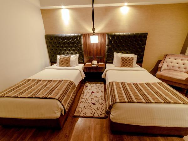 Sarovar Portico Jaipur : photo 1 de la chambre chambre double ou lits jumeaux premium