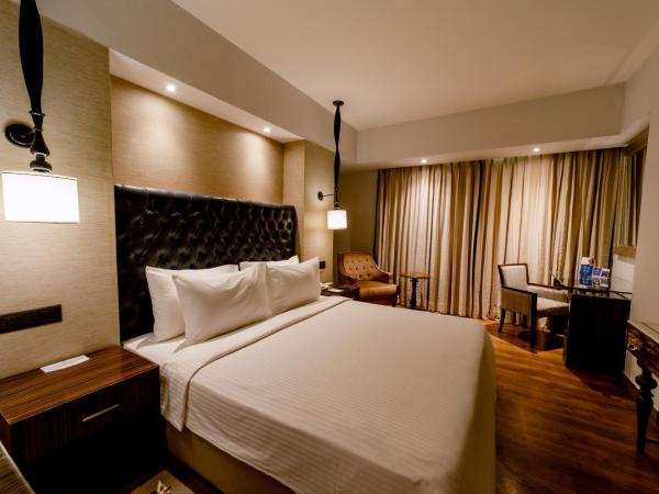 Sarovar Portico Jaipur : photo 3 de la chambre chambre double ou lits jumeaux premium