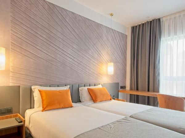 DWO Yuste Alcalá : photo 1 de la chambre chambre lits jumeaux