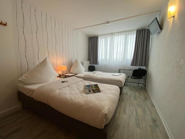 Pro Messe Hotel Hannover : photo 2 de la chambre chambre lits jumeaux standard
