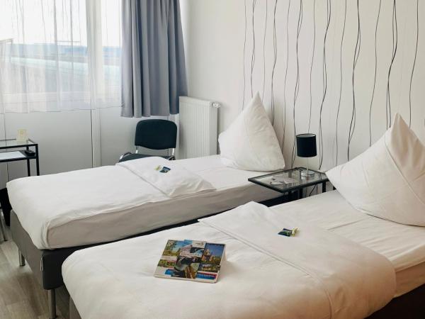 Pro Messe Hotel Hannover : photo 3 de la chambre chambre lits jumeaux standard