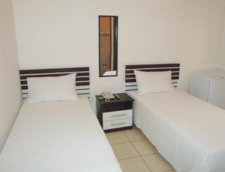 Campos Gerais Hotel : photo 1 de la chambre chambre lits jumeaux standard