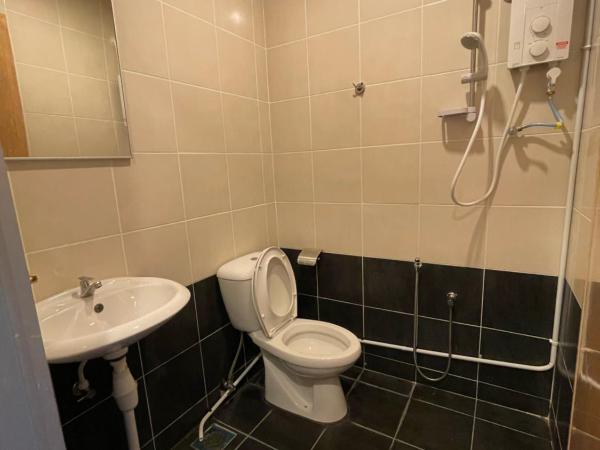 Cassia Inn Kuching : photo 1 de la chambre chambre lit queen-size deluxe