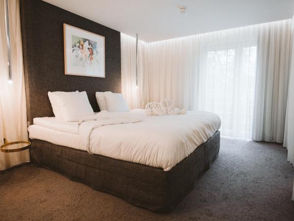 Vaeshartelt Maastricht : photo 2 de la chambre suite lit king-size