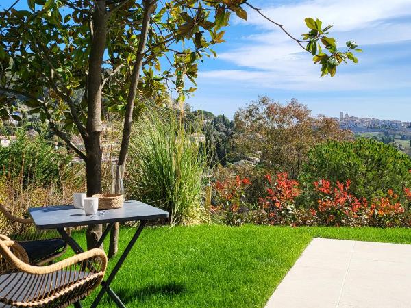 Ideal BnB : photo 8 de la chambre appartement avec piscine - vue sur jardin