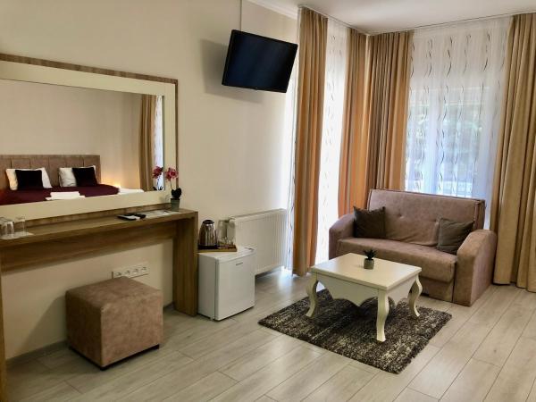 Alenso Guesthouse : photo 2 de la chambre chambre triple deluxe