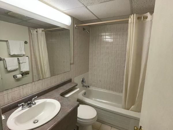 Heritage Inn & Suites : photo 4 de la chambre chambre lit queen-size deluxe