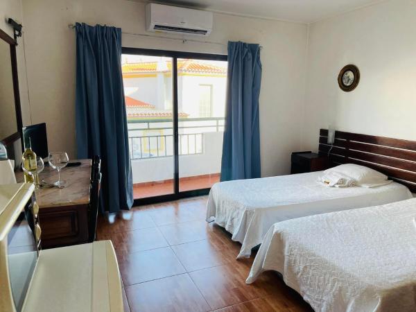 Casa Do Canto : photo 3 de la chambre chambre double ou lits jumeaux avec lit d'appoint