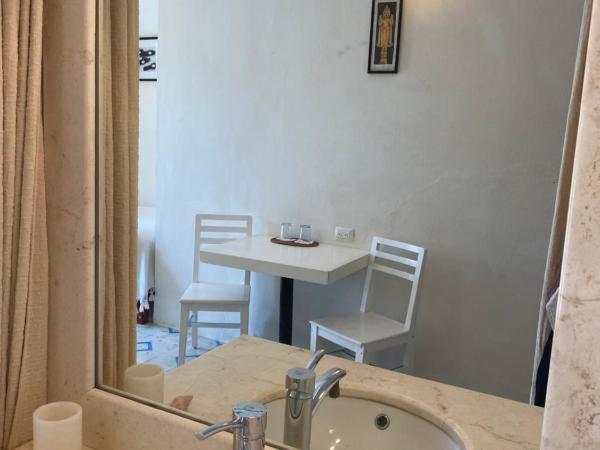 Hotel La Piazzetta : photo 5 de la chambre chambre lits jumeaux - vue sur parc