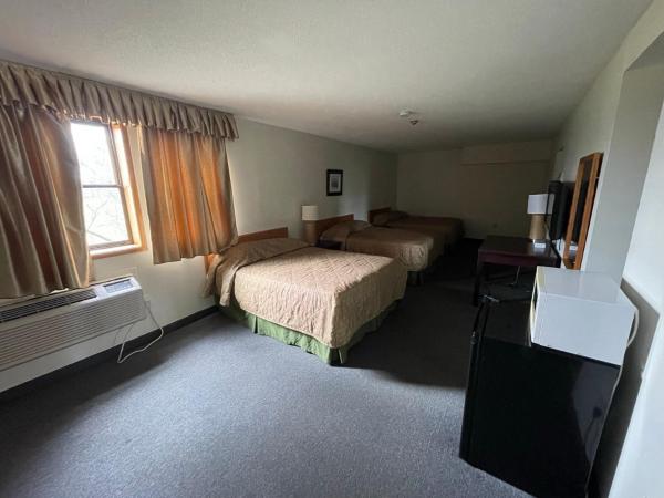 Heritage Inn & Suites : photo 1 de la chambre chambre triple standard