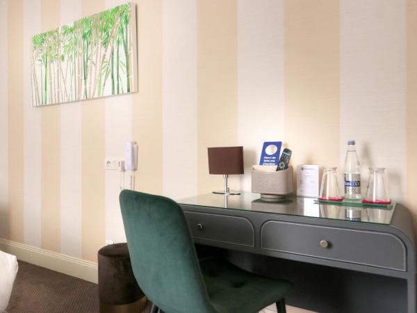 Best Western Hôtel Brittany La Baule Centre & Plages : photo 6 de la chambre chambre queen supérieure avec vue sur la cour