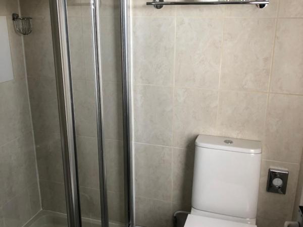 The Fossil Tree Hotel : photo 5 de la chambre chambre lit king-size - vue latérale sur mer