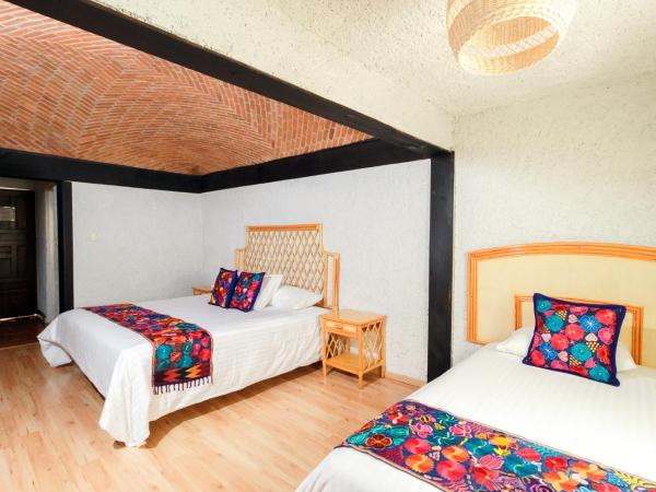 Hotel Hacienda Montesinos : photo 2 de la chambre chambre triple