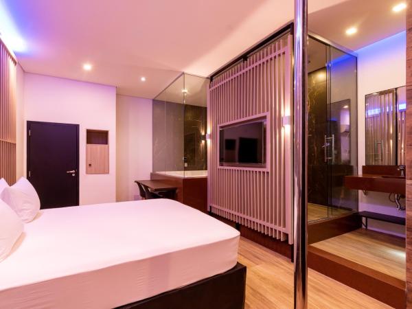 Drops Motel Manaus : photo 7 de la chambre suite deluxe avec baignoire spa