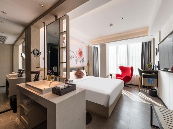 Paco Hotel Canton Tower Pazhou--FreeShuttle Bus for CantonFair : photo 3 de la chambre chambre double avec salle de bains privative