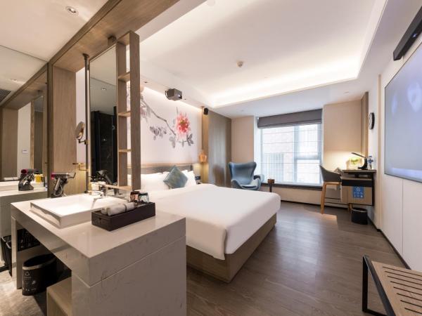 Paco Hotel Canton Tower Pazhou--FreeShuttle Bus for CantonFair : photo 1 de la chambre chambre double avec salle de bains privative