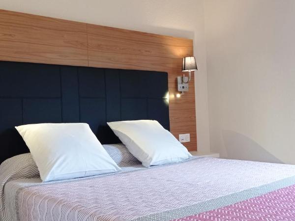 Hotel Hélios : photo 4 de la chambre chambre double - piscine chauffée et parking gratuit