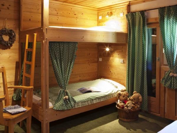 le A by neige et roc : photo 1 de la chambre chambre familiale avec baignoire