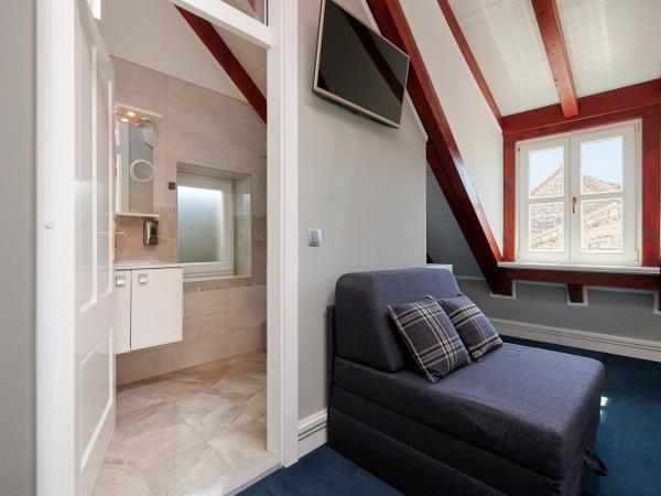 Palace Central Square : photo 6 de la chambre chambre double deluxe (2 adultes + 1 enfant)