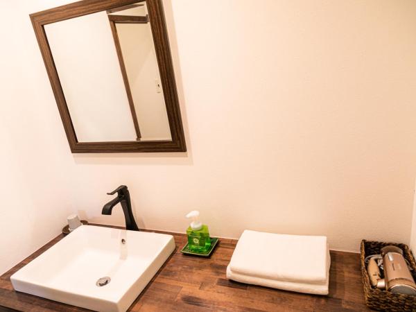 OKI's Inn : photo 4 de la chambre chambre lits jumeaux supérieure de style japonais