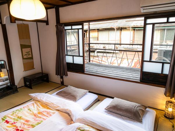 OKI's Inn : photo 1 de la chambre chambre lits jumeaux standard style japonais