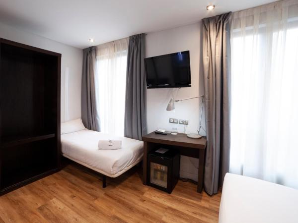 Petit Palace Arana Bilbao : photo 2 de la chambre chambre double ou lits jumeaux avec lit d'appoint