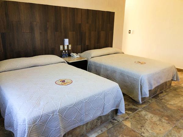 Hotel Conquistador : photo 3 de la chambre chambre quadruple