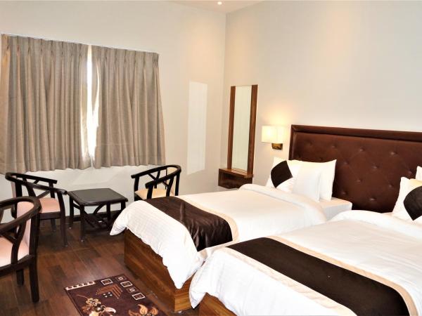 Neel Clarks Inn Express : photo 4 de la chambre chambre lits jumeaux deluxe