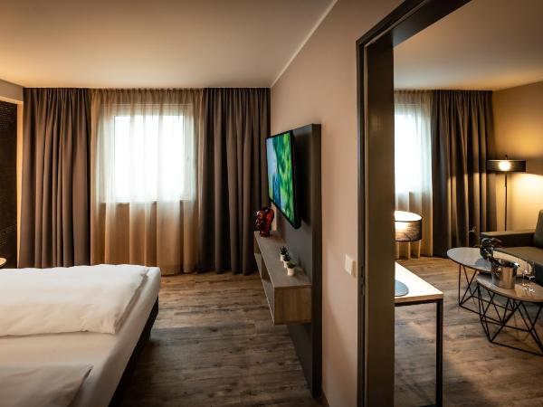 LOGINN Hotel Stuttgart Zuffenhausen : photo 9 de la chambre appartement deluxe