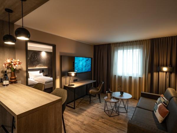 LOGINN Hotel Stuttgart Zuffenhausen : photo 10 de la chambre appartement deluxe