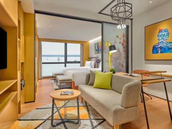 Artyzen Habitat Lingang Shanghai : photo 1 de la chambre chambre double – vue sur lac
