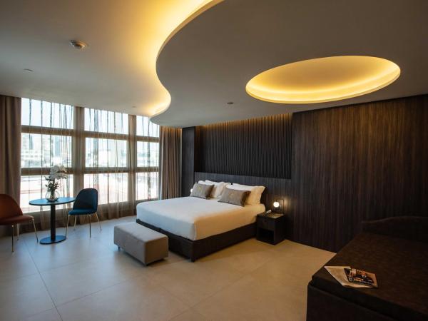 Gold Tower Lifestyle Hotel : photo 1 de la chambre chambre deluxe double ou lits jumeaux