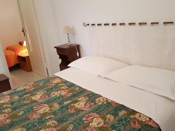 Il Giardino del Nespolo : photo 2 de la chambre chambre familiale avec salle de bains privative séparée