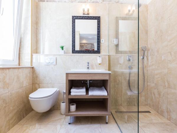 B&B Giardin exclusive rooms and suite : photo 5 de la chambre chambre double deluxe - vue latérale sur mer