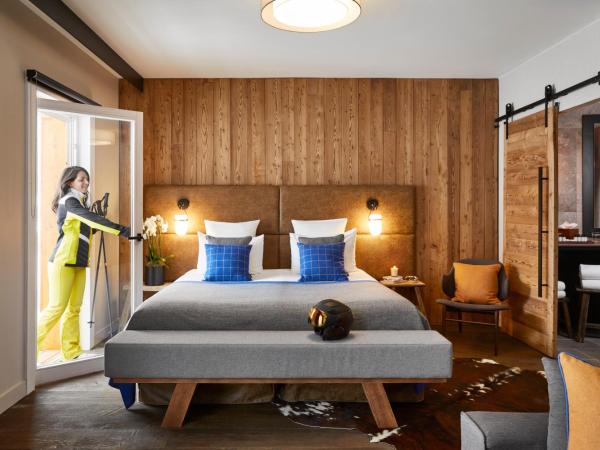 Ecrin Blanc Resort Courchevel - Aquapark : photo 1 de la chambre suite supérieure avec accès au parc aquatique