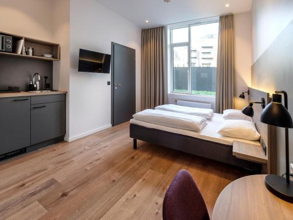 Go Hotel City : photo 2 de la chambre grande chambre double 