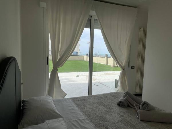 Residence Belvedere Vista : photo 9 de la chambre one bedroom apartment with terrace and partial sea view